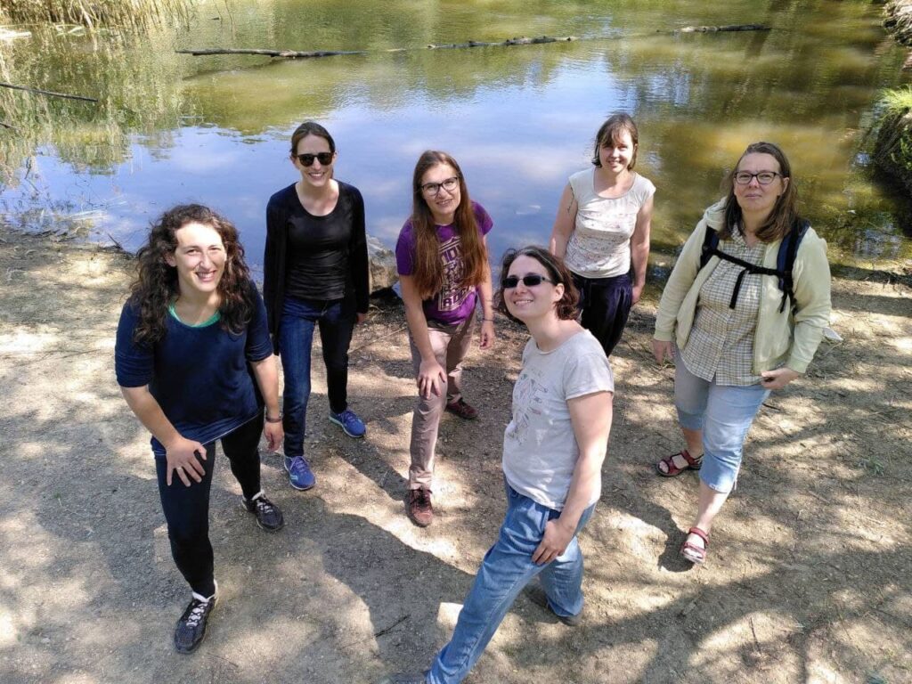 A group of people posing for the camera